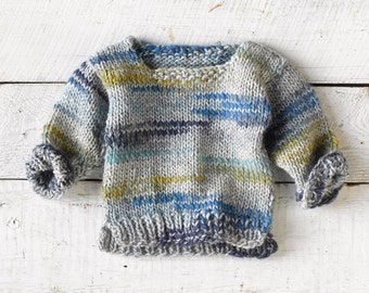 Beautiful Hand Knit One of a Kind Baby Sweater size 0-6 months. Washable wool acrylic blend in shades of blues, yellow, gray.