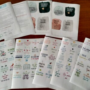 May include: A set of printable sheets with motivational quotes in Italian. The sheets feature watercolor backgrounds with floral designs. The quotes are printed in black and white text. The sheets are titled "Messaggi Positivi" and "Il Barattolo della Felicita".