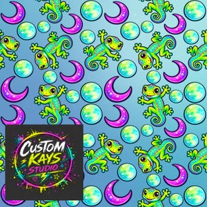 May include: A repeating pattern featuring bright green geckos, vibrant pink crescent moons, and glowing blue-green orbs on a light blue background. A black square logo in the corner displays the text CUSTOM KAYS STUDIO in white stylized font.