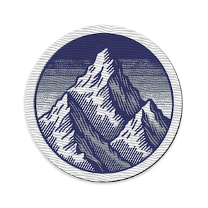 May include: A round, blue and white coaster featuring a graphic of a mountain range. The mountain range is in a vintage style with a textured look.