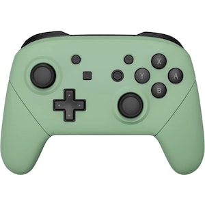May include: A green Nintendo Switch controller with black buttons and a black d-pad.