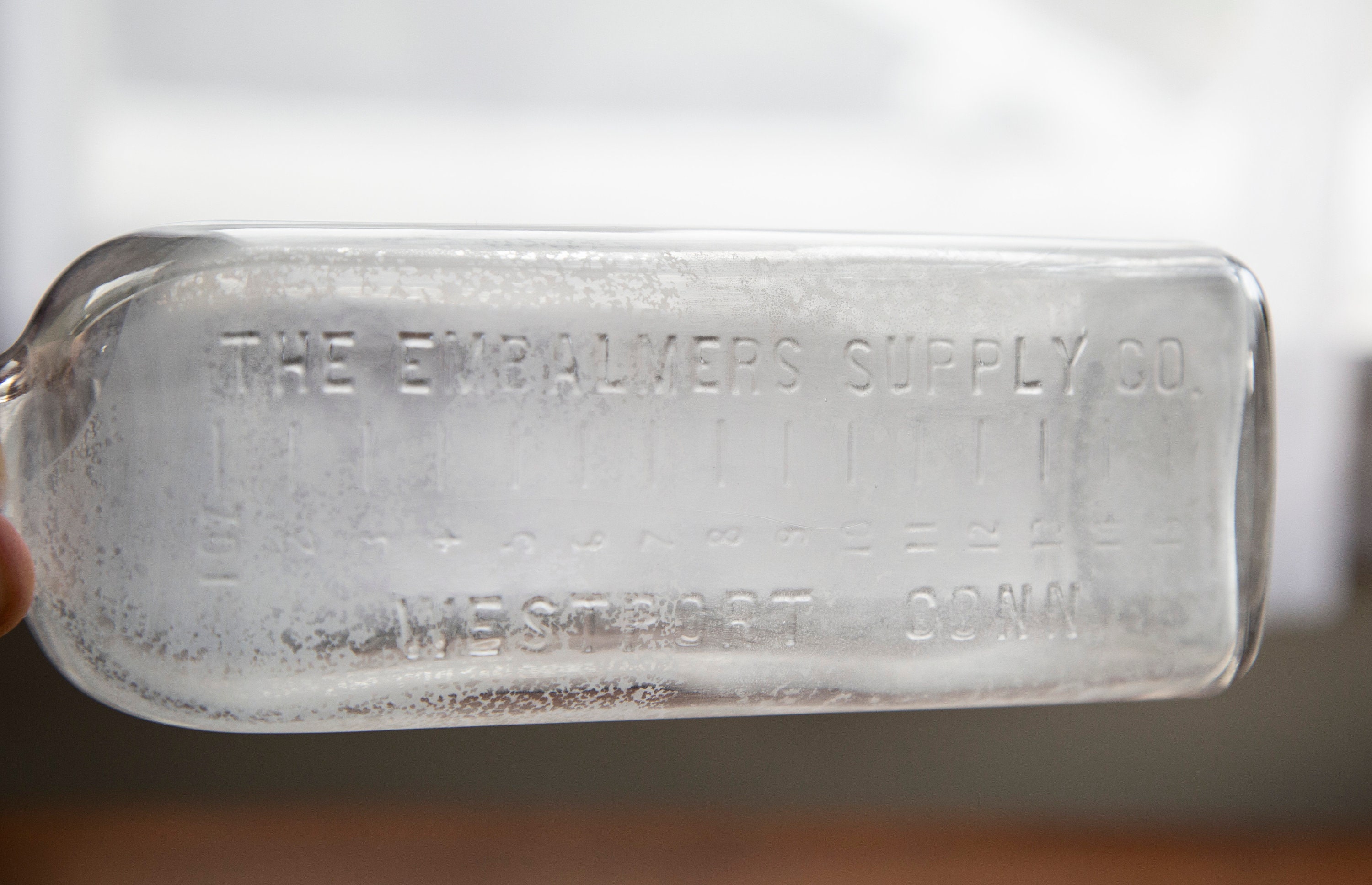 vintage-antique-rectangular-embalming-bottle-from-the-dodge-chemical