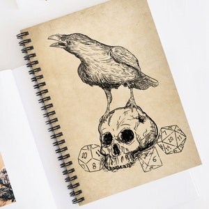 May include: A black and white illustration of a raven perched on a skull with dice scattered around it. The background is a vintage-style parchment paper.