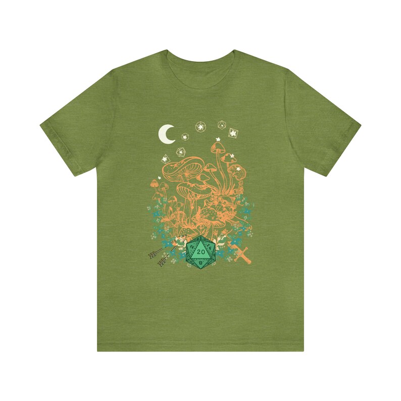 May include: Green t-shirt with a graphic of a crescent moon, stars, mushrooms, and a green 20-sided die.