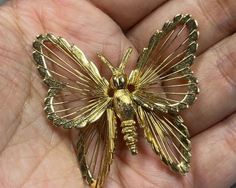Vintage MONET gold tone butterfly brooch