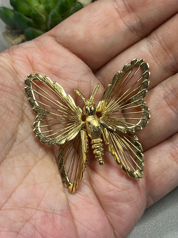 Vintage MONET gold tone butterfly brooch - image 1