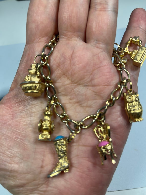 Vintage AVON gold tone charm bracelet - image 1