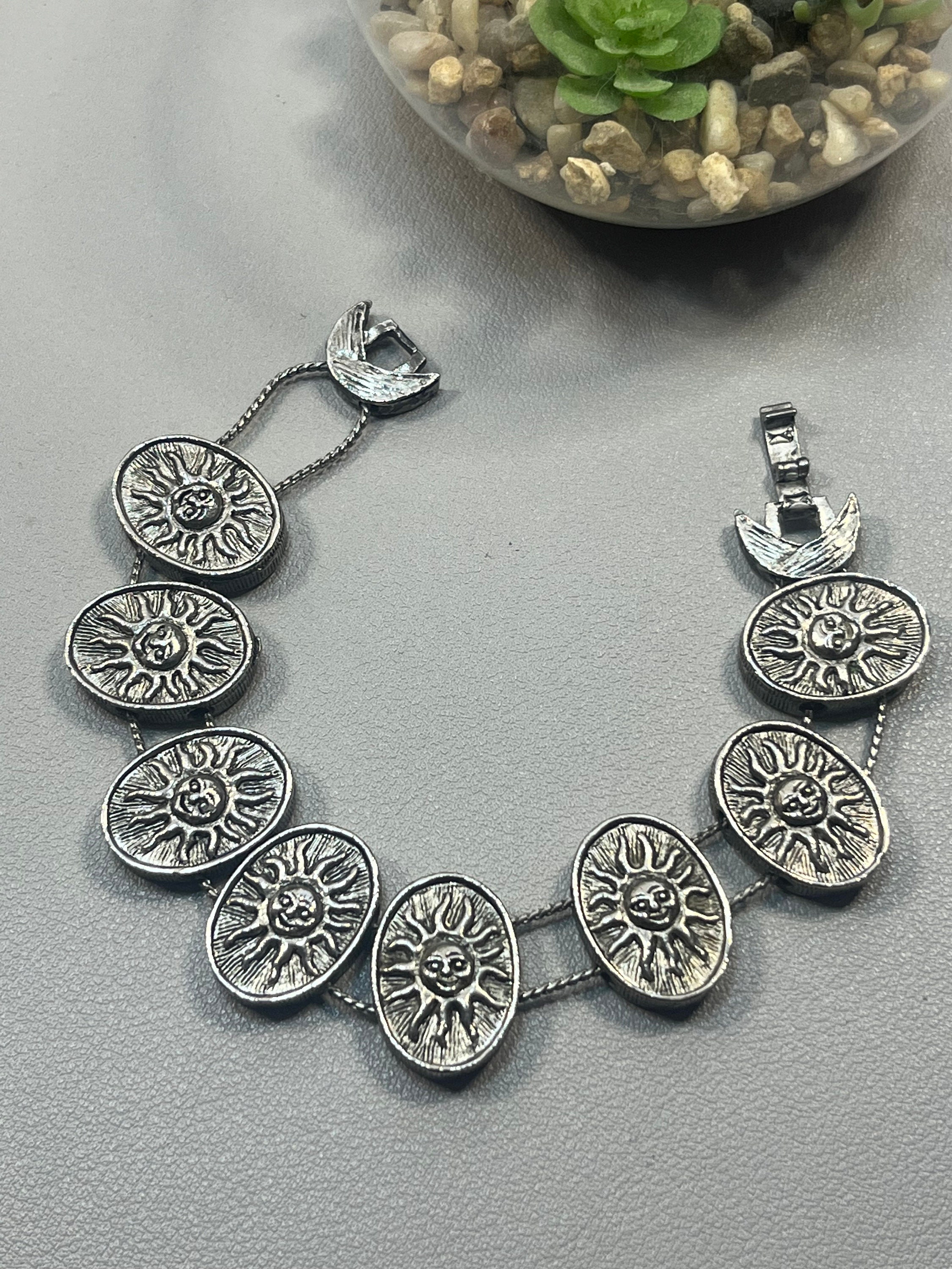 Vintage silver tone sun face slide bracelet