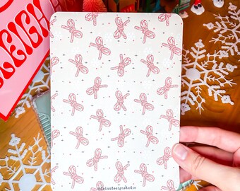 Kindle-inzetstuk met pepermuntstrik | Roze kerstthema, sneeuwvlokken