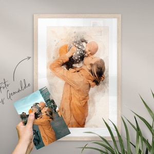 May include: A watercolor painting of a mother and child. The mother is holding the child in her arms and they are both looking at each other. The painting is in a light brown frame.