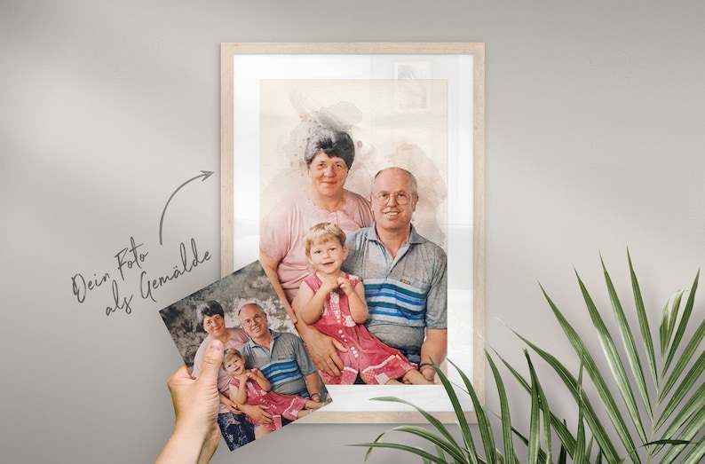 May include: A watercolor painting of a family portrait. The painting features a grandmother, grandfather, and a young girl. The grandmother is wearing a pink shirt, the grandfather is wearing a blue and white striped shirt, and the girl is wearing a pink dress. The painting is framed in a light wood frame.