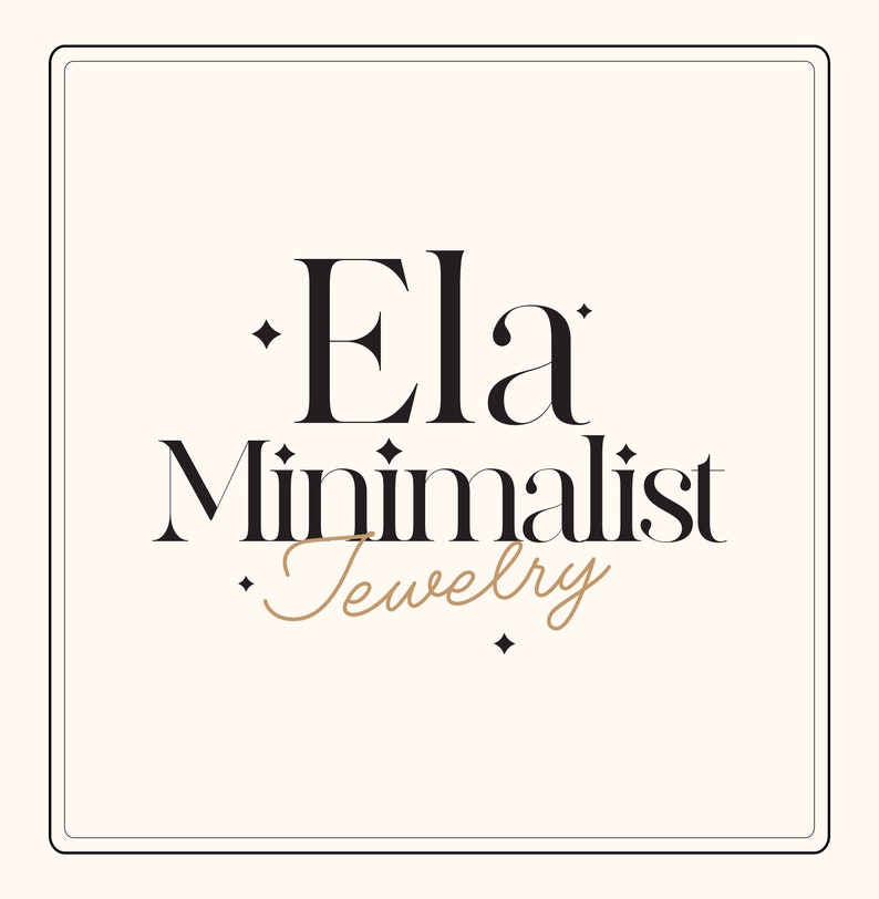 May include: A logo for a jewelry company called "Ela Minimalist Jewelry". The logo is in black and white with a gold cursive font for the word "Jewelry".