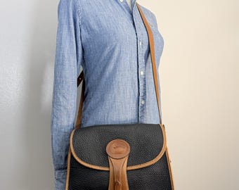 Vintage Dooney Bourke AWL Crossbody Bag Black Pebbled Leather British Tan Trim 1990s