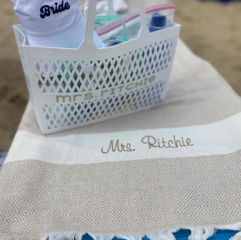 Personalized Turkish beach towel, custom beach towel, personalized gifts, custom wedding gifts, bridesmaid gifts, bachelorette party favors, gifts for her, personalized wedding gifts, custom bridesmaid towels, embroidered beach towels, unique gifts for her, Turkish towels, custom gifts for women, beach towels with initials, bridal party gift ideas, personalized towels for bride, beach towel gift for bridesmaid, custom name beach towel, thoughtful wedding gift.