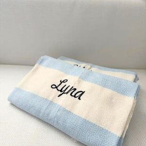 Personalized Turkish beach towel, custom beach towel, personalized gifts, custom wedding gifts, bridesmaid gifts, bachelorette party favors, gifts for her, personalized wedding gifts, custom bridesmaid towels, embroidered beach towels, unique gifts for her, Turkish towels, custom gifts for women, beach towels with initials, bridal party gift ideas, personalized towels for bride, beach towel gift for bridesmaid, custom name beach towel, thoughtful wedding gift.