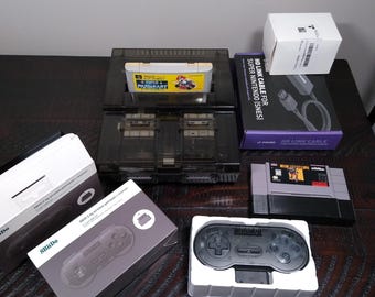 Super Nintendo SNES Console with New Shell, 2 New Wireless Controllers, Mario Kart, MechWarrior, New HDMI converter, and New Power Supply.