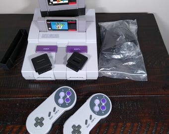 Super Nintendo Console with Mario World, Zoop, Wireless Controllers, HDMI Converter. Refurbished