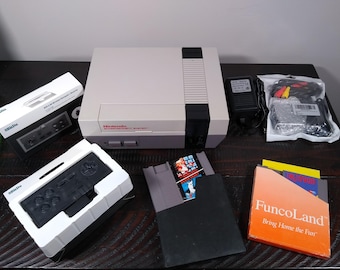 Nintendo Entertainment System(NES) Console with 2 Wireless Controllers, Mario/DuckHunt, Dr Mario, New Powersupply, and New HDMI.