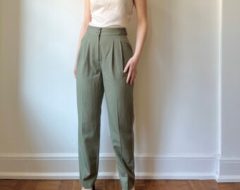 Vintage green high waisted trousers with side buckles