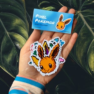Zestaw naklejek Pixel Eeveelutions / Zestaw 9 sztuk / Błyszczący / Eevee, Umbreon, Espeon, Sylveon, Jolteon, Leafeon, Glaceon, Flareon, Vaporeon