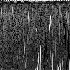 May include: Black fringe trim with a beaded top edge. The fringe is made of long, thin strands, creating a textured, cascading effect. This trim is suitable for various craft and sewing projects, adding a decorative element to garments or accessories.