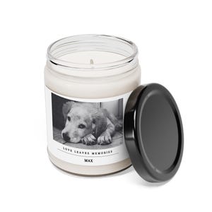 a candle with a picture of a dog on it