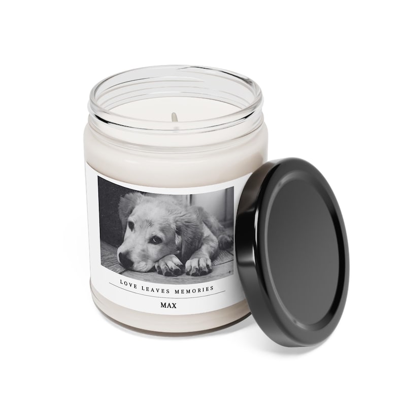 a candle with a picture of a dog on it