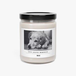 a candle with a picture of a dog on it