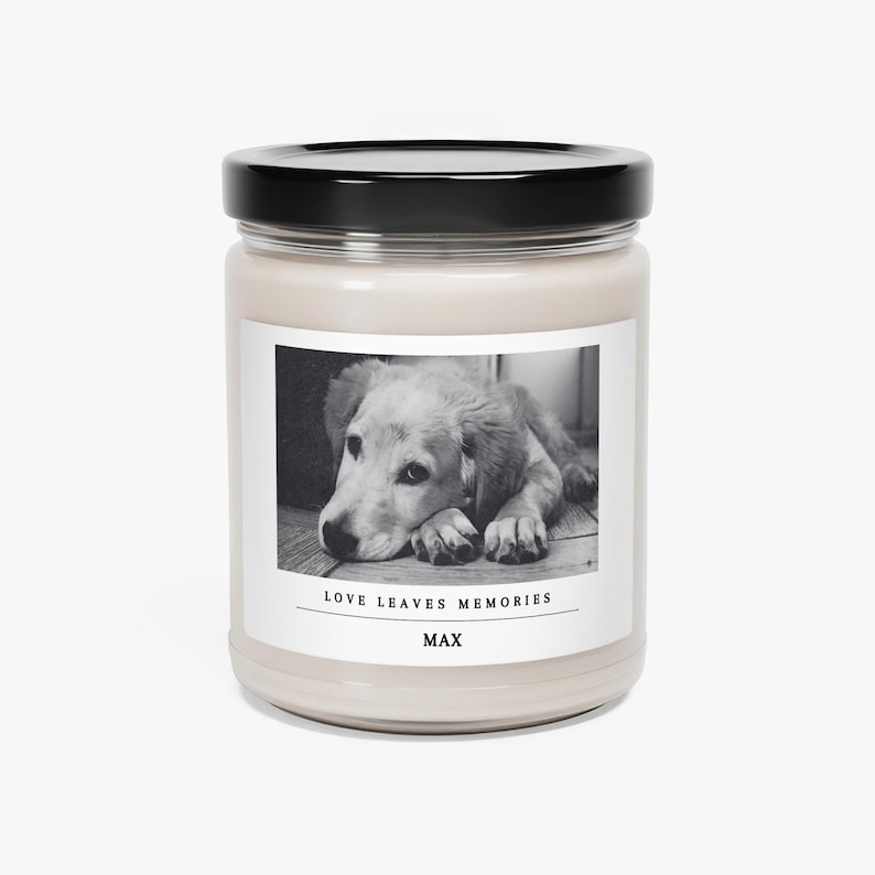 a candle with a picture of a dog on it