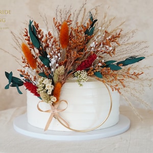 バーントオレンジの秋、ケーキトッパーブーケ、フラワーケーキトッパー、ドライブーケ、ウェディングケーキの花、ウェディングケーキの花のデコレーション