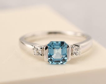Asscher cut Swiss blue topaz wedding ring silver light blue November birthstone ring