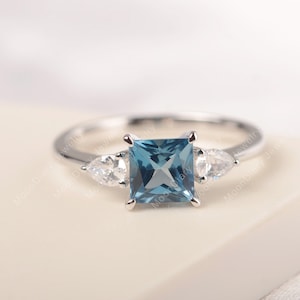 November birthstone genuine London blue topaz statement ring solid silver princess cut three stone ring