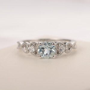 Round cut light blue aquamarine ring March birthstone white gold engagement ring