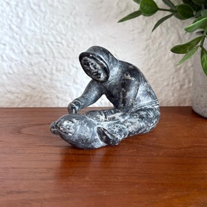 Inuit Soapstone Seated Man with Seal Carving Signed | Arctic Sculpture | Indigenous Canadian Art