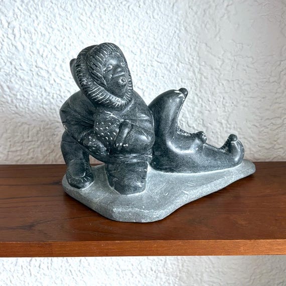 Signed Tivi Etok Inuit Soapstone Carving: Hunter With Seal