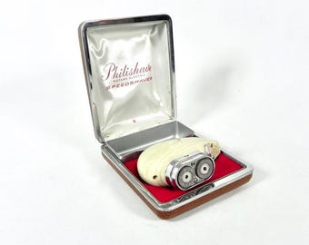 Maquinilla de afeitar eléctrica Philishave vintage: modelo 7830 de los años 50, Holland, con estuche