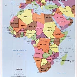 May include: A colorful map of Africa, showing countries in various shades. The map includes the North Atlantic Ocean, South Atlantic Ocean, and Indian Ocean. Country names are clearly labeled, with a scale at the bottom.