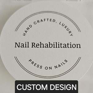 May include: A white circle with black text that reads "Hand Crafted, Luxury Nail Rehabilitation Press On Nails" and a black rectangle with white text that reads "Custom Design".
