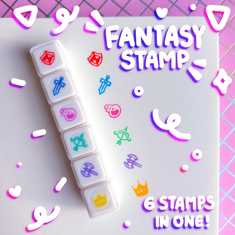May include: A white Fantasy Stamp set with six different fantasy-themed stamps. The stamps include a shield, sword, potion, bow and arrow, axe, and crown. The text "FANTASY STAMP" and "6 STAMPS IN ONE!" are also visible.
