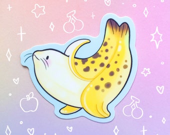 May include: A cartoon seal wearing a yellow banana peel as a hat. The seal is white with black spots and has a light blue background. The image is surrounded by white hearts, stars, and plus signs.