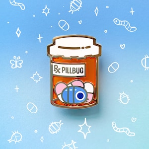 May include: Gold pill bottle enamel pin with a blue pill bug inside and the text "Rx Pillbug" on the label.