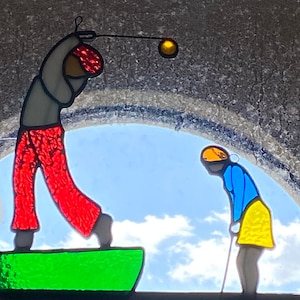 Vintage stained glass golfers