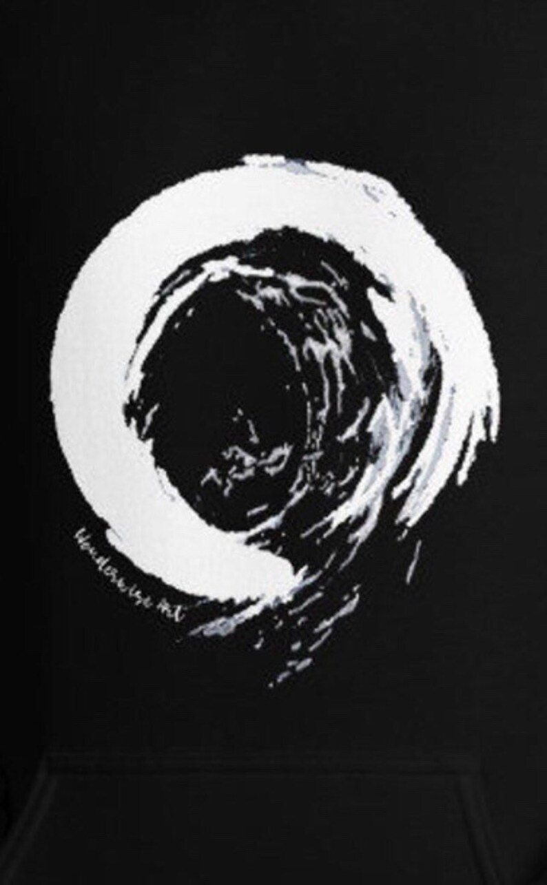 May include: Black hoodie featuring a white, abstract design resembling a swirling vortex or brushstroke. The artwork has a textured appearance, with the words "WONDERWISE ART" printed in white along the bottom of the design. The hoodie is a minimalist style.