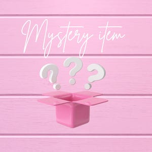May include: A pink open box with three white question marks floating above it. The words "Mystery item" are written in cursive script above the question marks. The background is a pink wooden plank design.