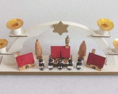Classy white-gold Christmas village candle holder, Erzgebirge figurine candelabra, vintage four candle stand, charming German holiday decor