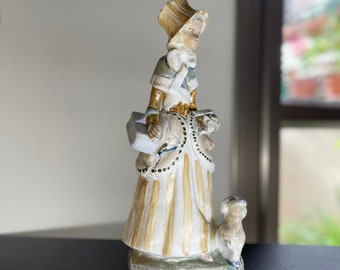 Figurina vintage in porcellana ceramica Ingles Spagna Lady con fiori / cane raro