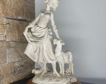 Statuina vintage in porcellana biscuit di Capodimonte / Ragazza con capra, firmata H. Tivella