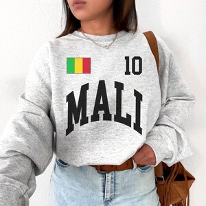 マリ クルーネック、マリ ジャージ、マリ T シャツ、マリ ギフト、マリ シャツ、マリ T シャツ、マリ ファン ギフト、マリ ゲーム、マリ ワールド カップ、ワールド カップ ジャージ