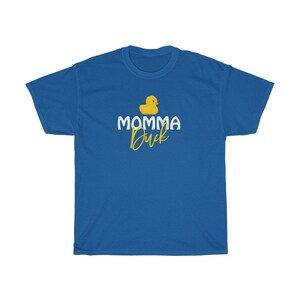 May include: A royal blue t-shirt featuring a yellow rubber duck and the text "MOMMA Duck" in white and yellow lettering.