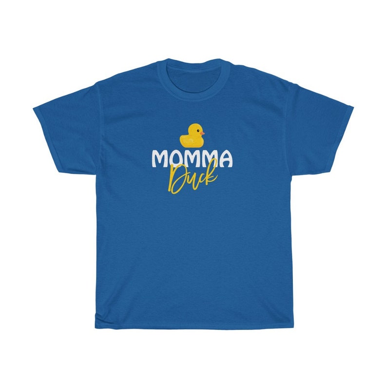 May include: A royal blue t-shirt featuring a yellow rubber duck and the text "MOMMA Duck" in white and yellow lettering.
